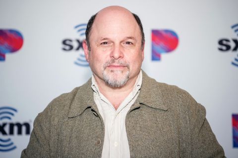 Jason Alexander poses for a picture during an interview.